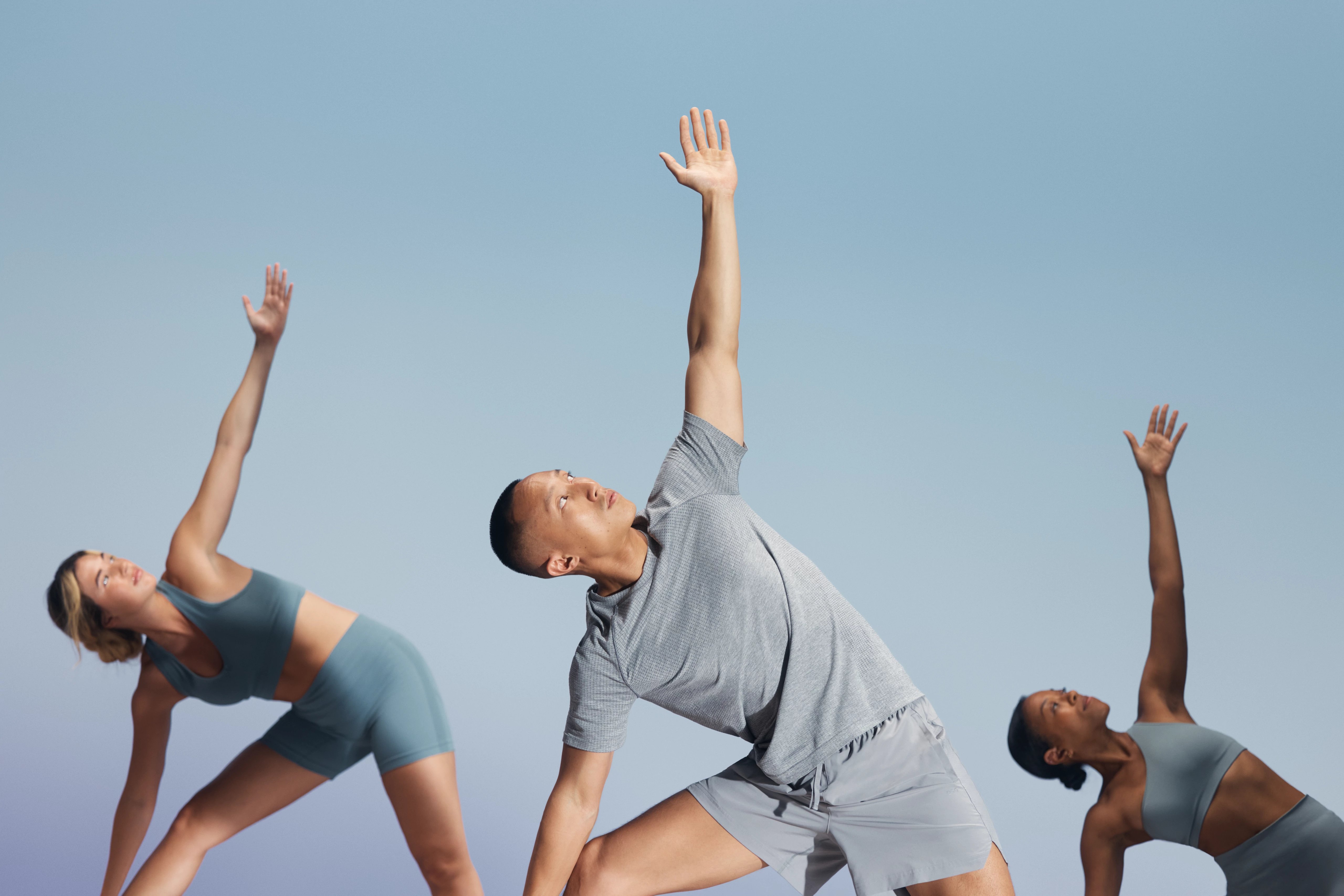 sol-yoga-participants-in-triangle-pose